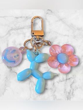 Iridescent Balloon Dog & Flower Keychain - Blue & Pink
